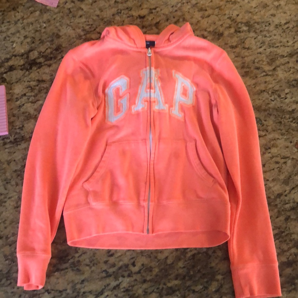 A kids Gap zip up jacket.